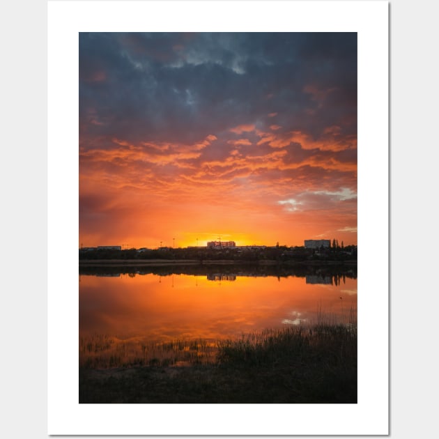 dramatic sunset sky reflecting on pond Wall Art by psychoshadow